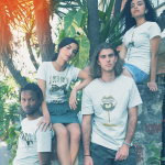 interracial-group-of-friends-wearing-t-shirts-mockup-near-plants-a20092